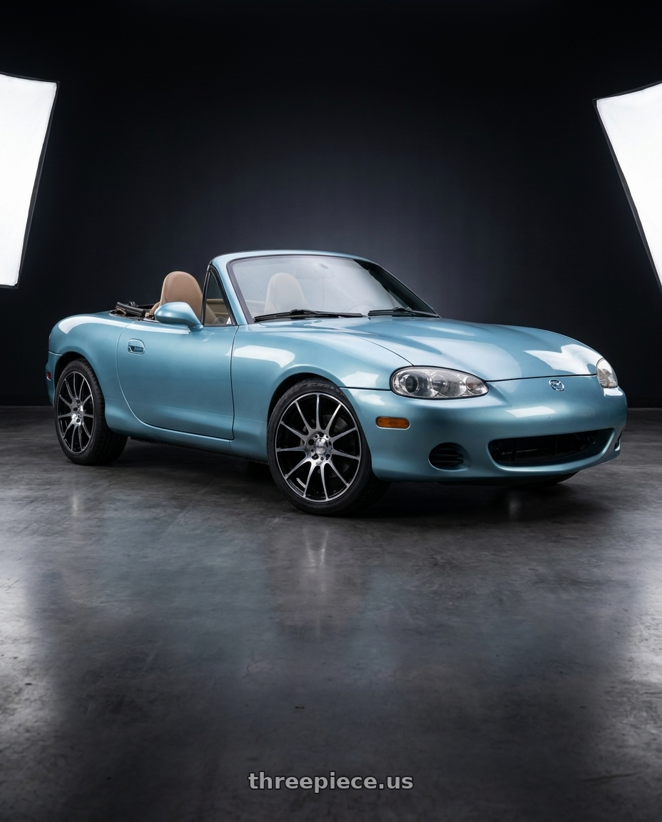 2002 Mazda Miata with Maxxim 44B Champ 4X100/4x114.3 14x6 +38 Machined Face w/Gloss Black wheels