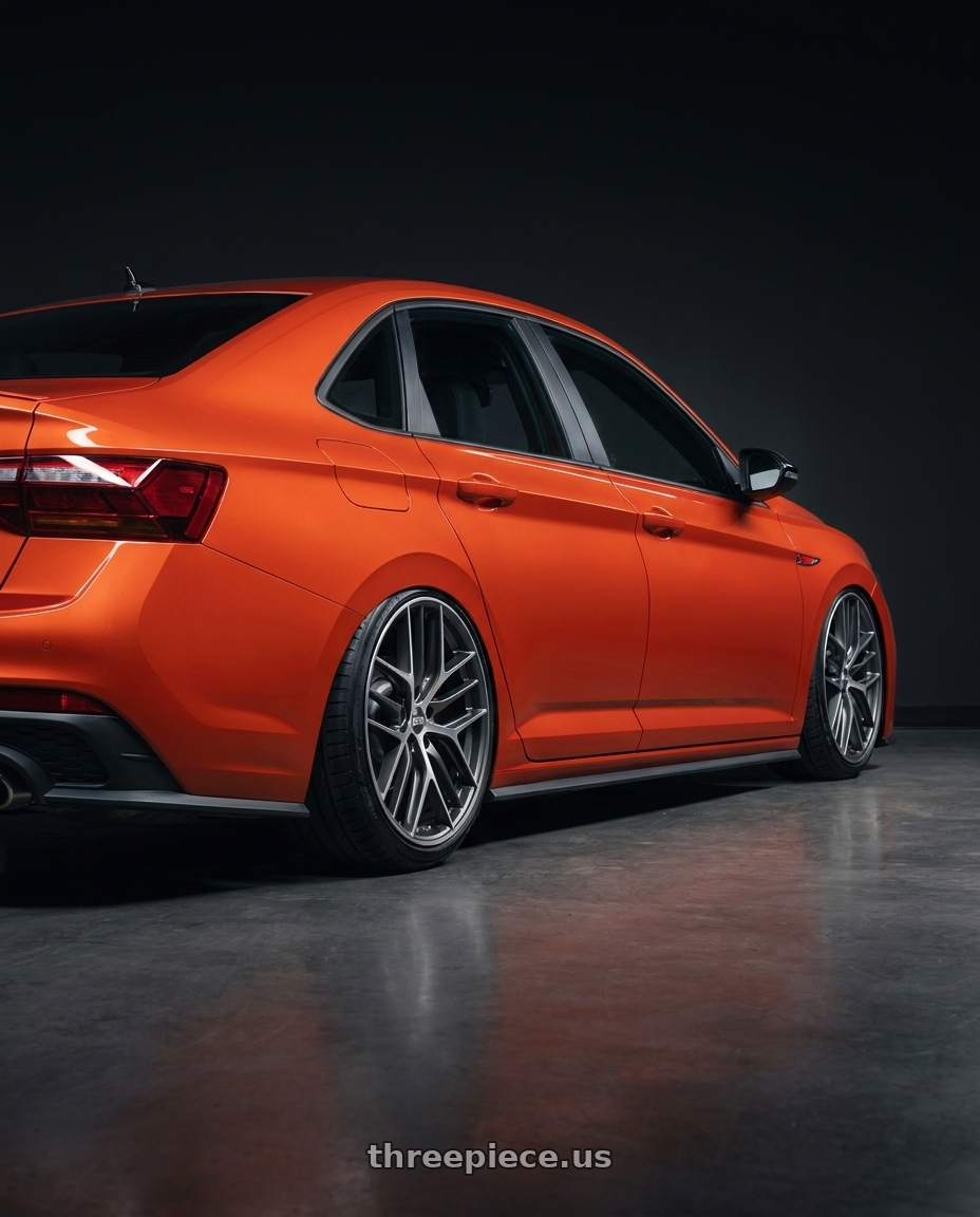 2023 Volkswagen Jetta GLI MK7 with BBS CC-R 5x112 19x9.0+42 Graphite w/ Diamond Cut Face wheels rear three quarter view slight stretch tires