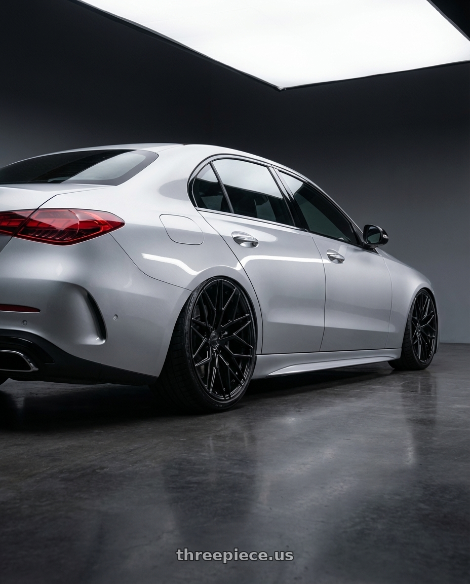 2022 Mercedes-Benz C-Class W206 with Avant Garde Wheels M520R 5X112 19x8.5 +35 Gloss Black wheels rear three quarter view slight stretch tires