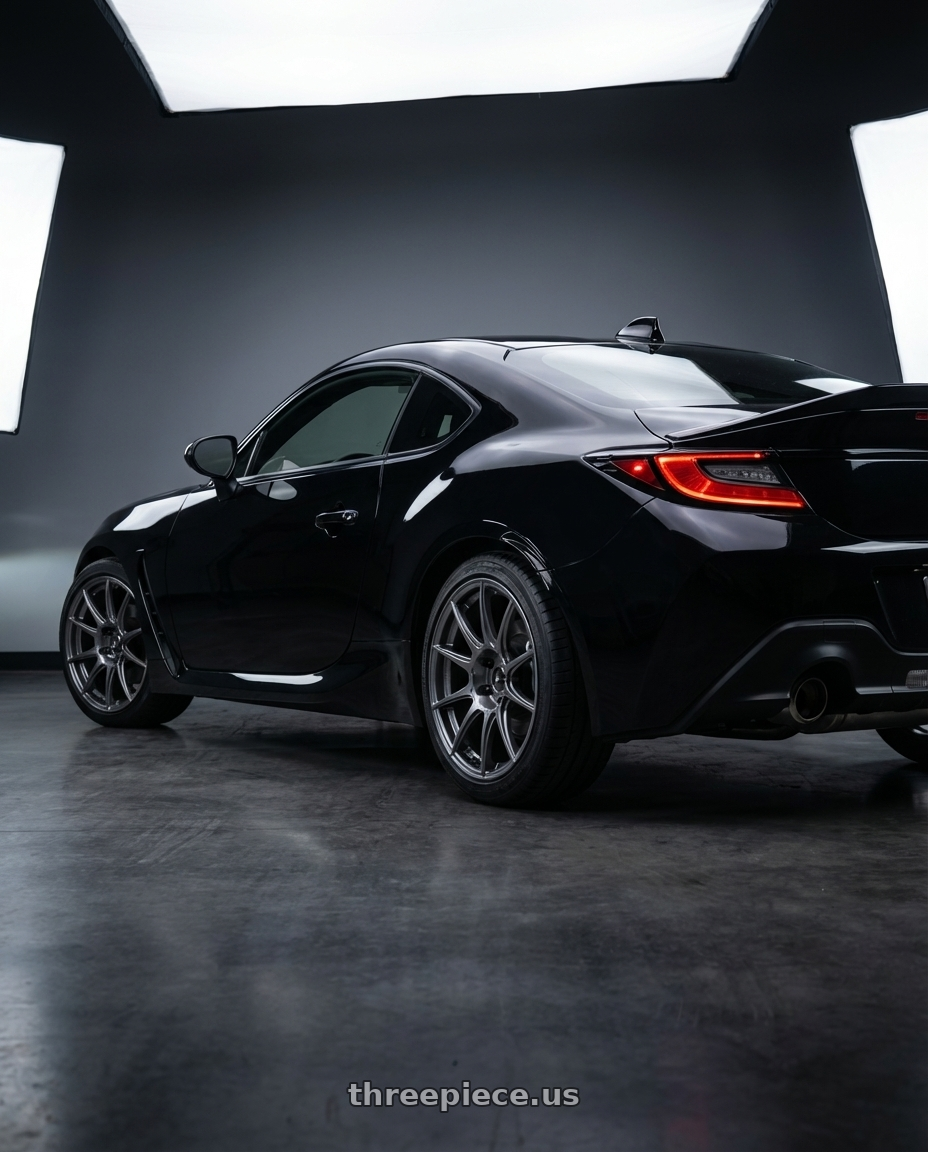 2025 Toyota GR86 Black with Ssr Gtx01 5x100 18x9.5+40  DARK SILVER wheels rear three quarter view slight stretch tires