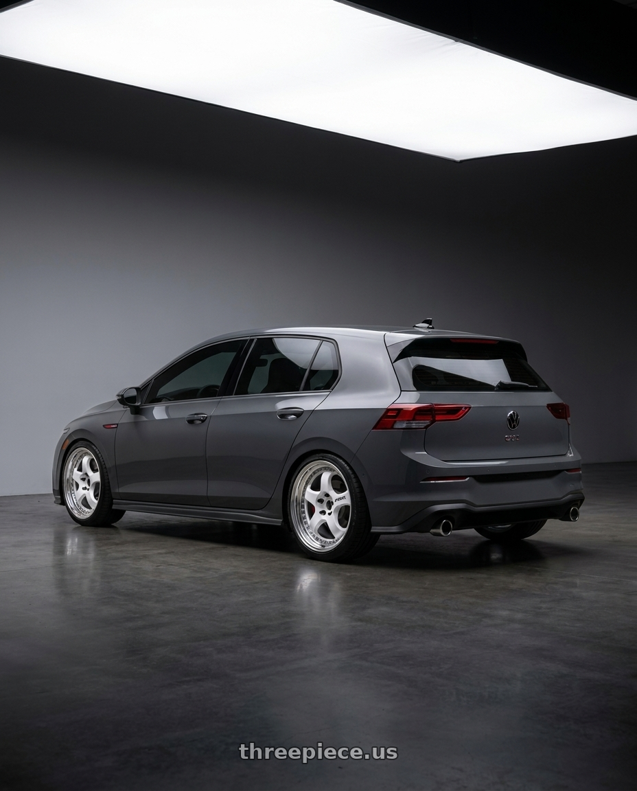2024 VW GTI SE GRAPHITE GREY  with Work Meister S1 3P 5x112 18x8.5+35 L Disk White wheels rear three quarter view square tires