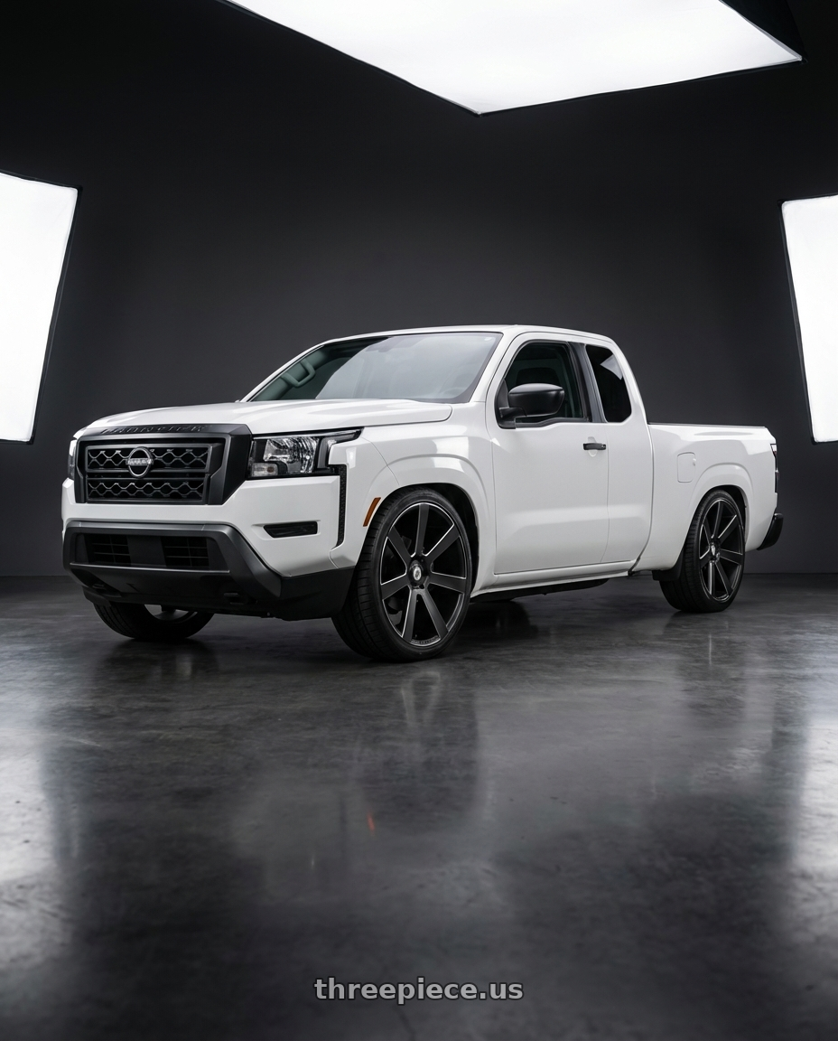 2025 Nissan Frontier kingcab white base model with Asanti Black ABL-15 APOLLO 6X139.7 24X9 +15 SATIN BLACK MILLED wheels front three quarter view slammed stance