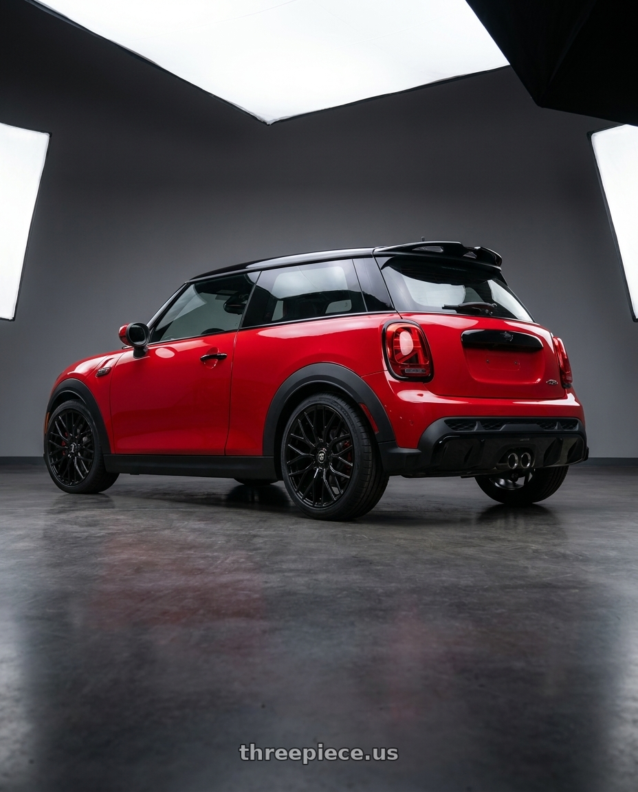2025 mini jcw red with TOUREN TR76 3276 5x112 20x8.5 +35 GLOSS BLACK wheels rear three quarter view square tires
