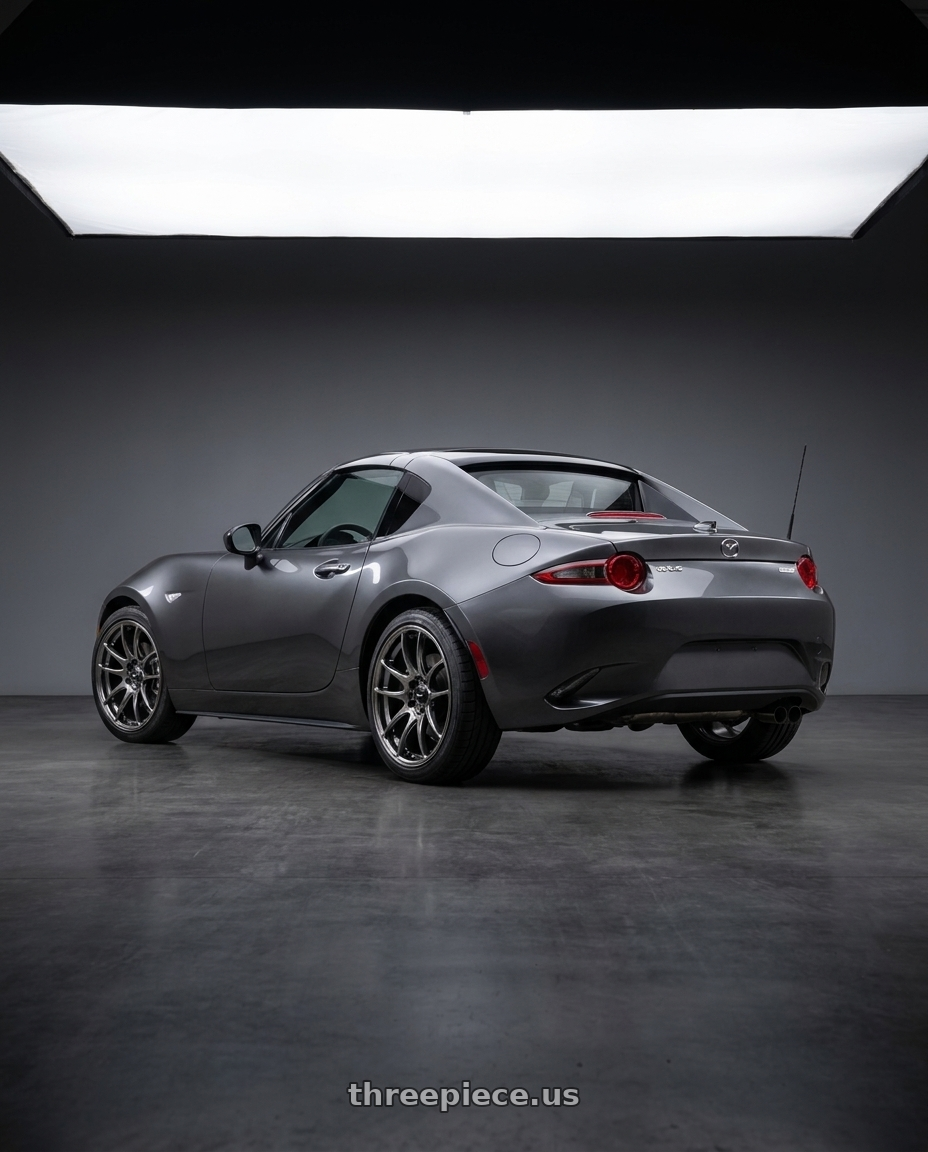 2023 mx-5 miata rf grand touring  machine gray metallic  with Vors TR4 4x100/4x114.3 17x8  +35 Hyper Black wheels rear three quarter view square tires