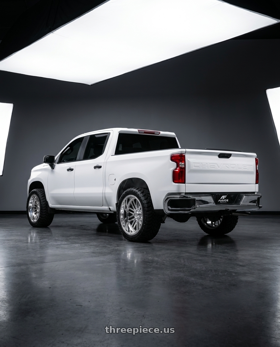 2021 Chevy Silverado Custom with Amani Bario blank 6x 24x12 -44 Polished wheels rear three quarter view slight stretch tires