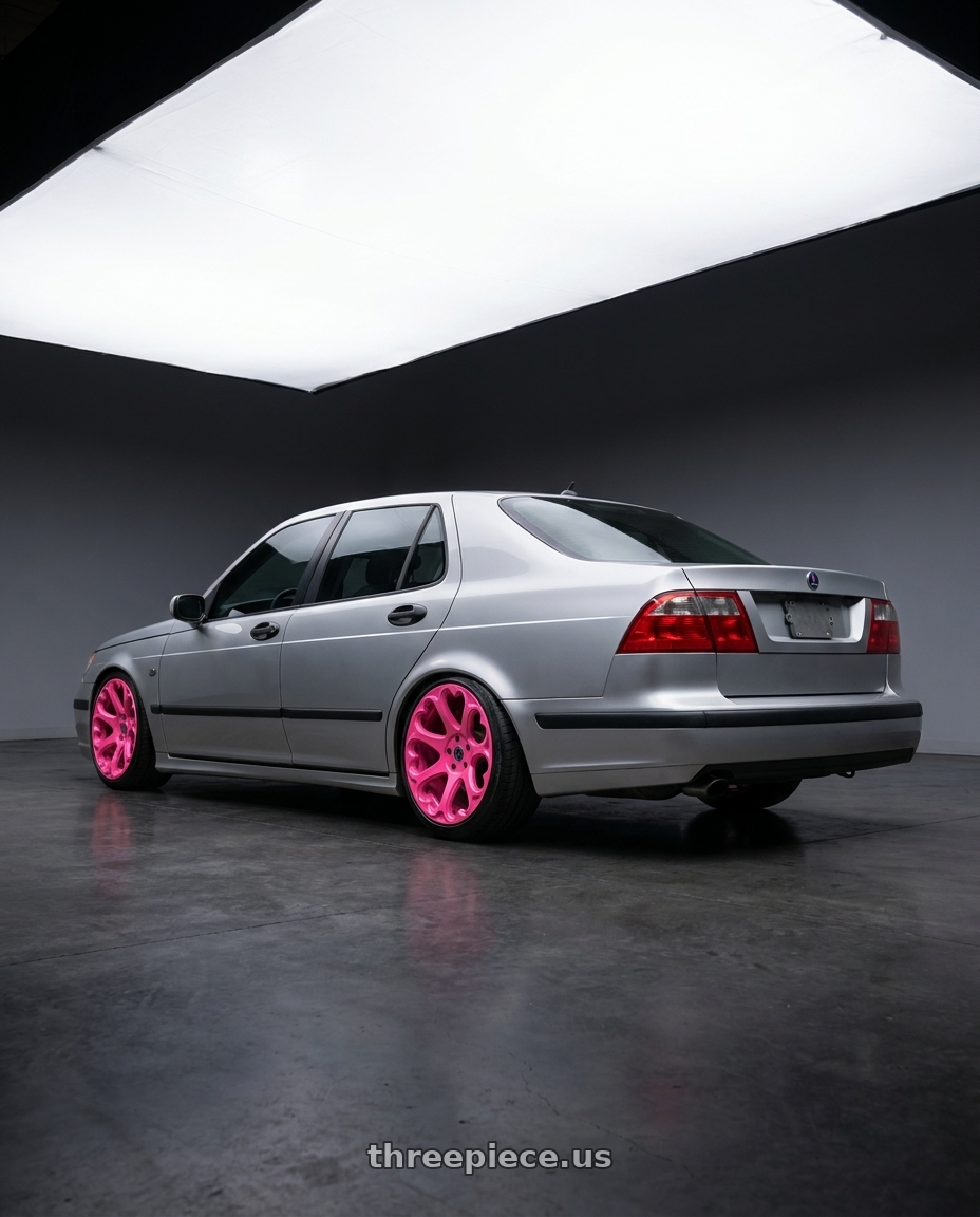 2004 Saab 9-5 arc with Heritage Wheel KOKORO 5x110 18x9.5 +22 Pink wheels rear three quarter view slight stretch tires