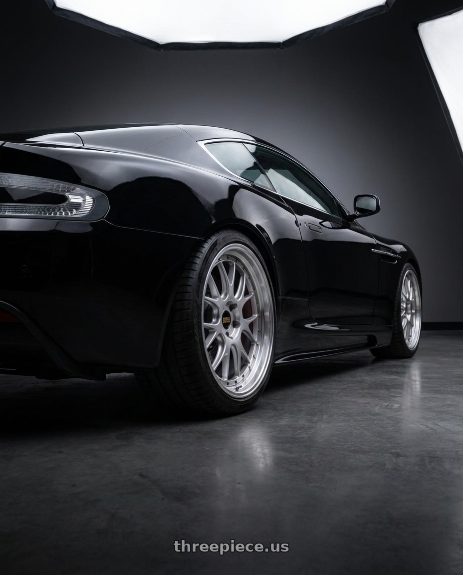 2009 Aston Martin DBS with BBS LM-R 5x114.3 19x8.5+43 Diamond Silver wheels rear three quarter view meaty tires