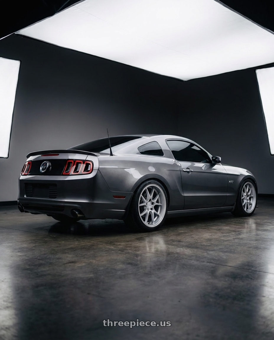 2014 Ford Mustang GT with Rotiform 207 5x114.3 19x9.5 +20 MATTE SILVER wheels rear three quarter view square tires