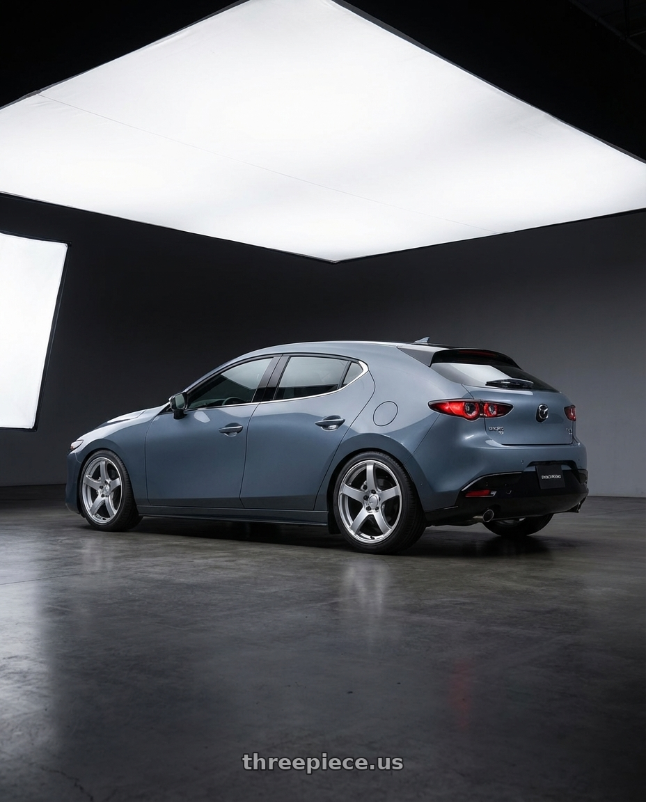 2023 Mazda Mazda3 Turbo with Ssr Gtv01 5x114.3 18x8.5+40  GLARE SILVER wheels rear three quarter view square tires