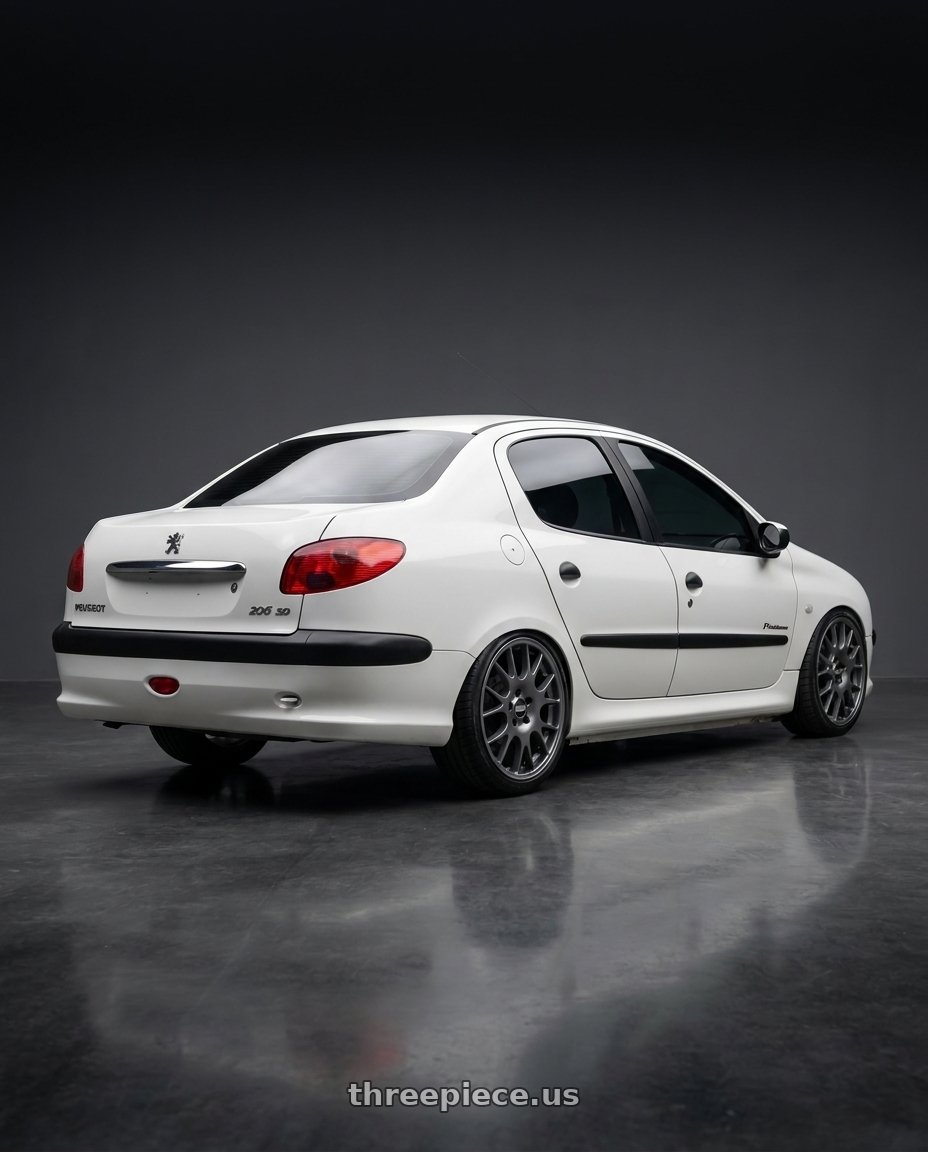 2011 Peugeot 206 SD with BBS CO 5x112 18x8 +44 Titanium wheels rear three quarter view slight stretch tires