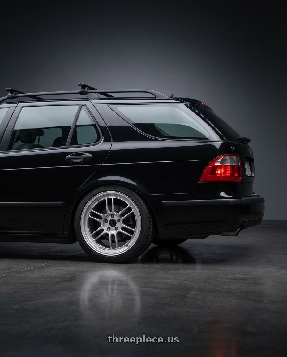 2007 saab 9-5 with Enkei RPF1 5x112 17x7.5+48 Silver wheels rear three quarter view square tires