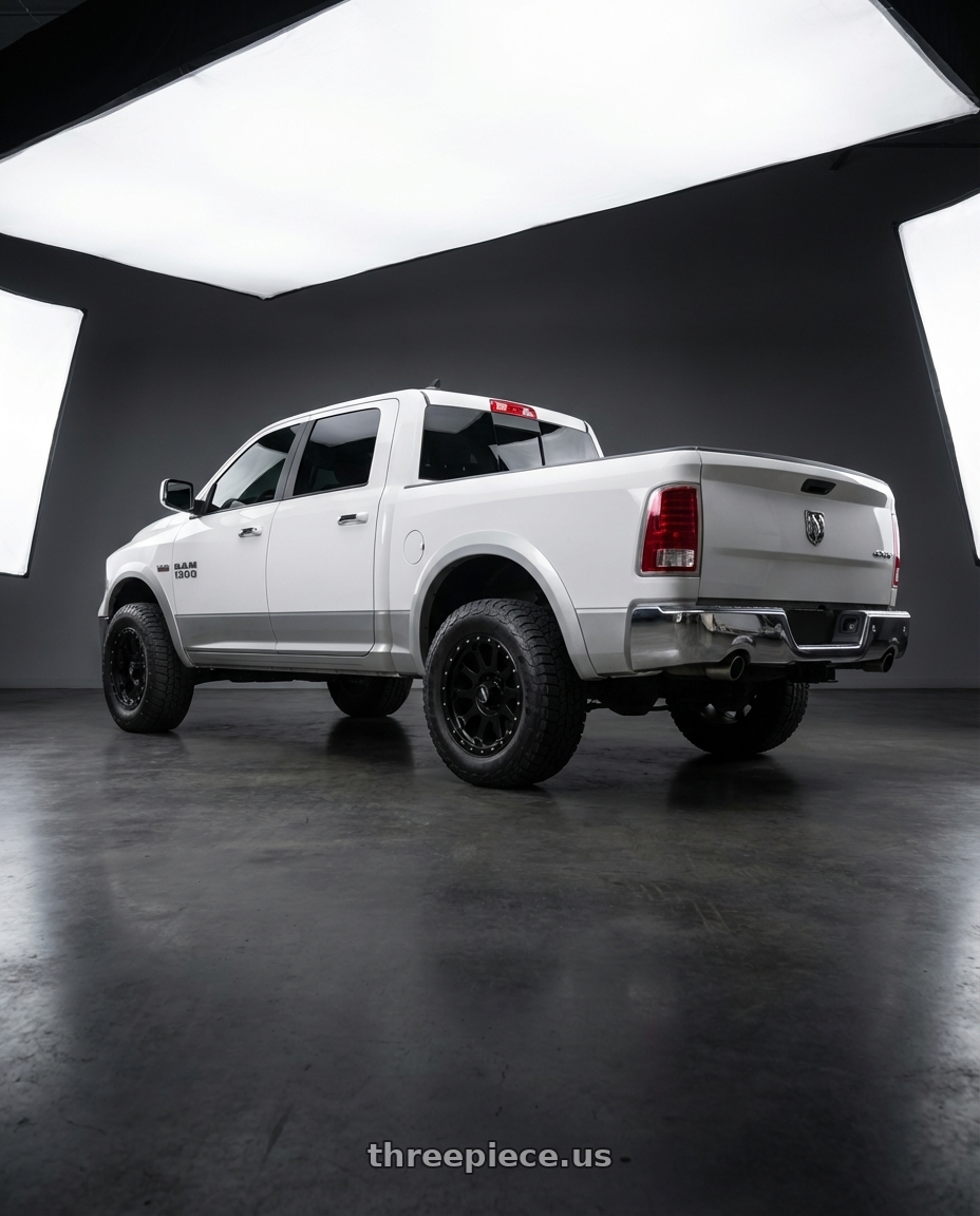 2016 dodge ram  with Method Race Wheels 605B NV 8X170 20x9 -12 MATTE BLACK wheels rear three quarter view meaty tires