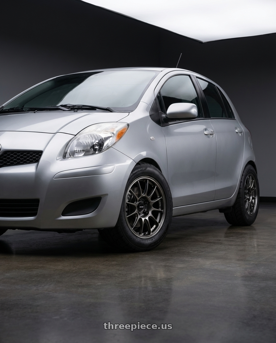 2009 toyota yaris with WedsSport TC105X 4x100 15x7.0+35 EJ Titan wheels