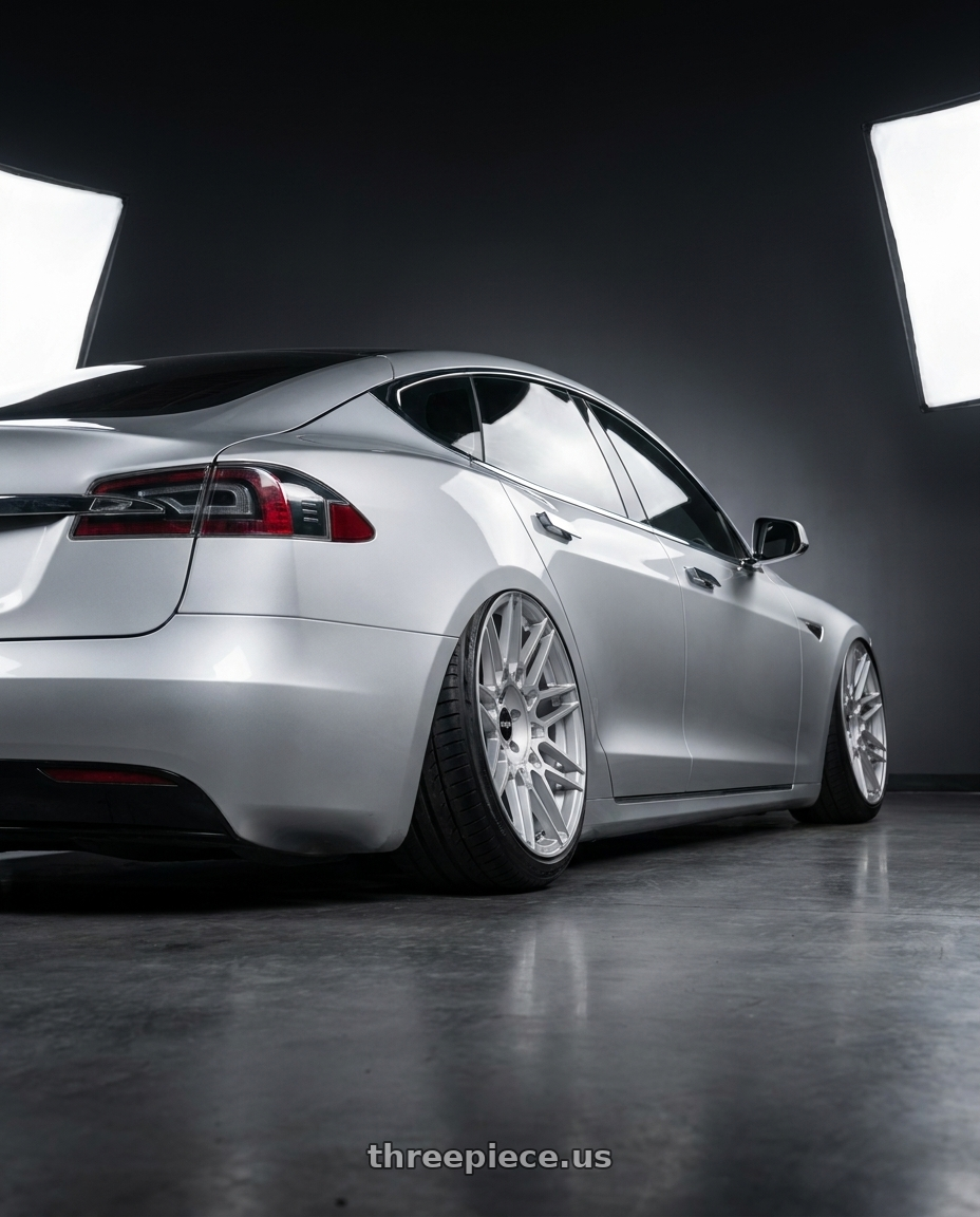 2018 tesla model s with Rotiform TDX 5x120 20x9 +27 Silver W/ Machined Face wheels rear three quarter view extreme stretch tires