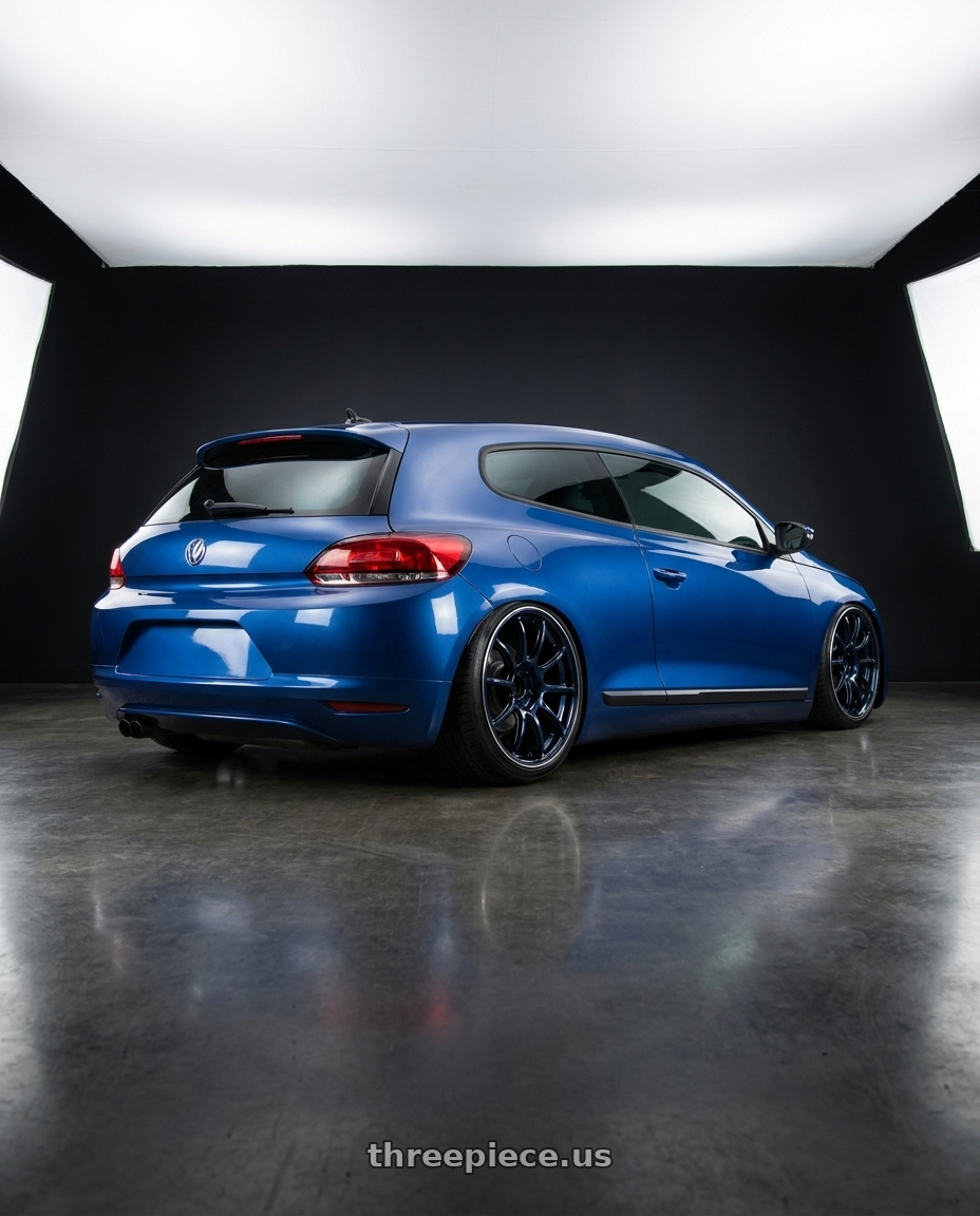 2010 Vw scirocco with Advan RZ II 5x112 19x8.5+45 Racing Indigo Blue and Ring wheels rear three quarter view slight stretch tires
