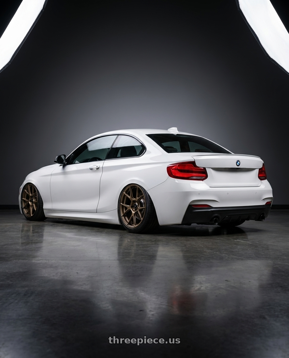 2018 BMW 2 Series F22 with Konig Ampliform 5x120 19x8.5+32 Gloss Bronze wheels rear three quarter view slight stretch tires