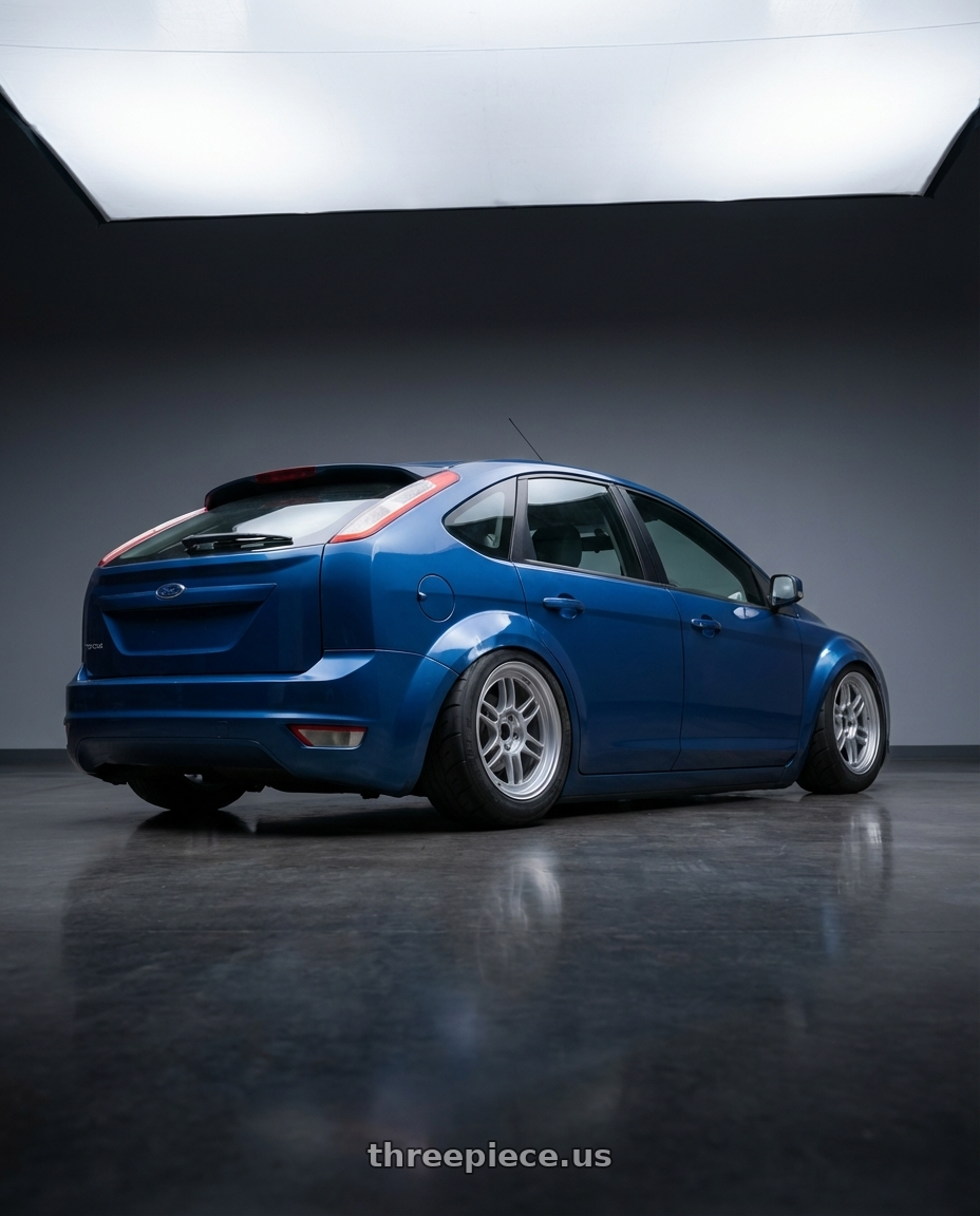 2011 ford focus with Enkei RPF1 5x100 16x7+35 Silver wheels rear three quarter view meaty tires