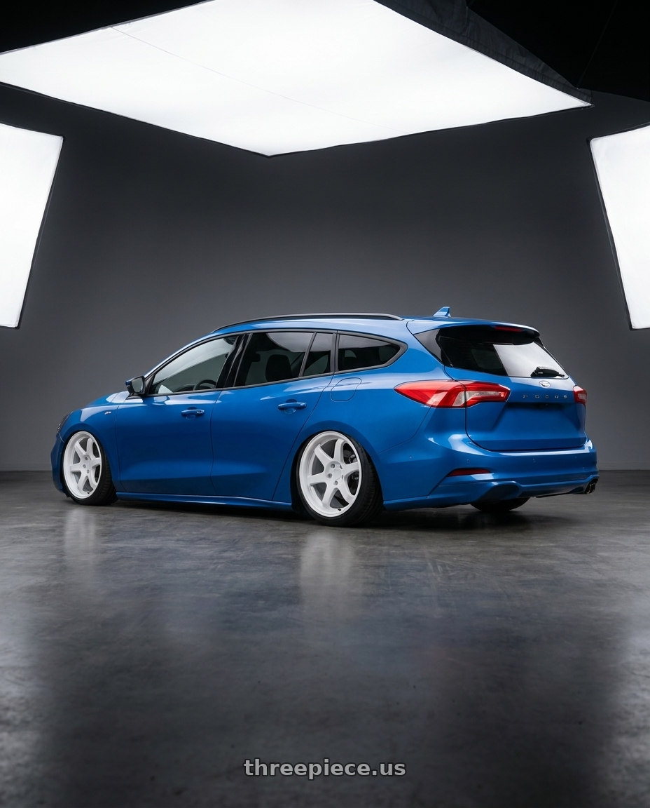 2023 Ford focus wagon stline with 9six9 SIX-1 5x108 18X8.5 +35 Competition White wheels rear three quarter view slight stretch tires