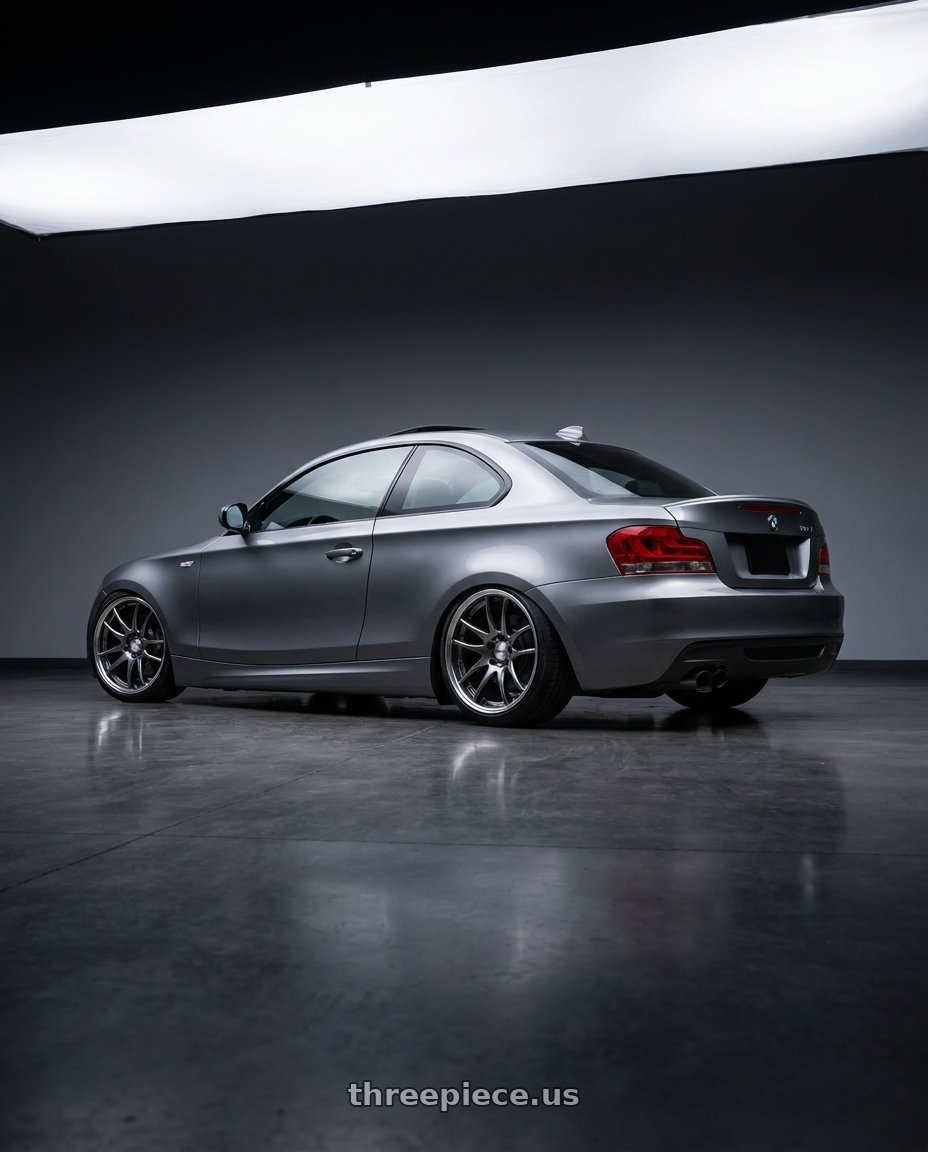 2011 bmw 135i with Work Emotion CR2P wheels rear three quarter view slight stretch tires
