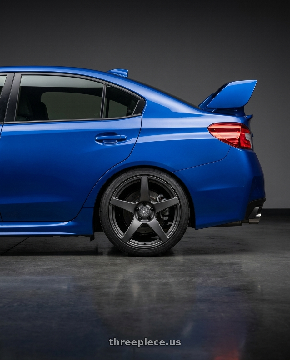 2018 Subaru WRX STI with Forgestar CF5 5x114.3 18x10 +42 Satin Black wheels rear three quarter view square tires