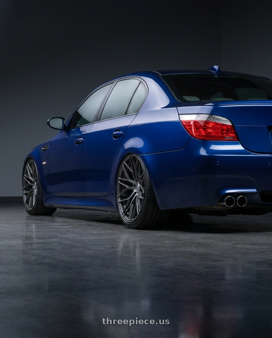 2010 BMW M5 E60 with Avant Garde Wheels M520R 5X120 20x11 +45 Dark Graphite Metallic wheels rear three quarter view slight stretch tires