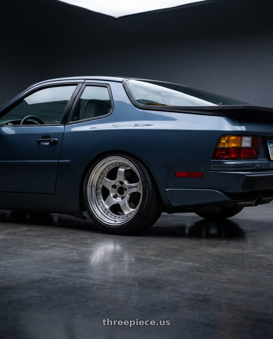 1989 Porsche 944 with Work Meister S1 3P 5x114.3 17x9+61 W Disk Bright Buff Finish wheels rear three quarter view slight stretch tires