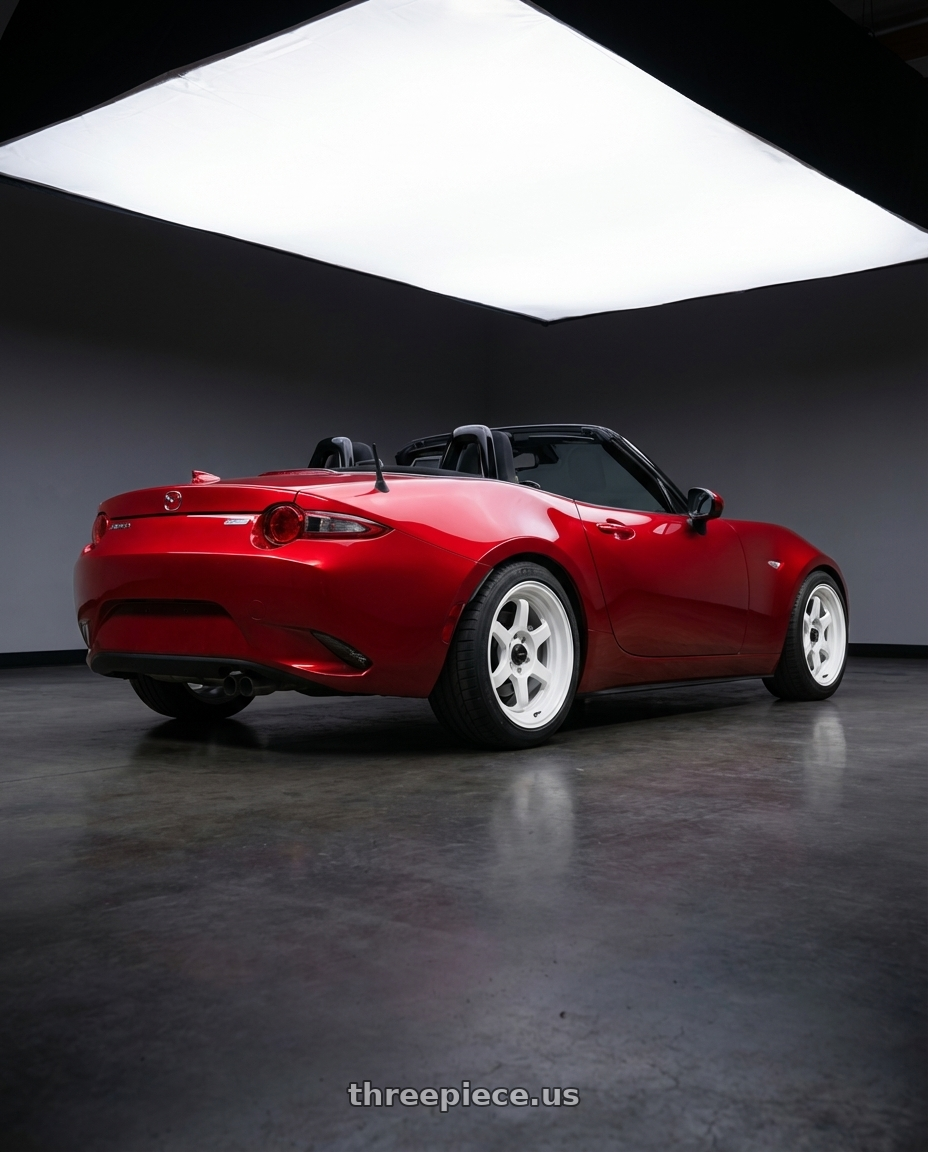 2016 Mazda Miata with Vors TR7 4x100/4x114.3 16x8  +20 All White wheels rear three quarter view square tires