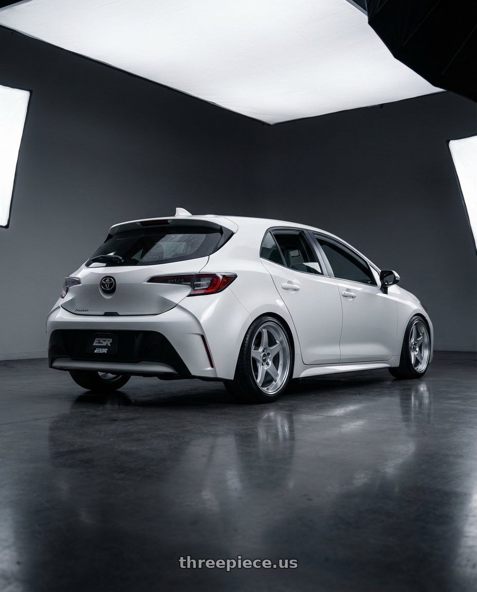 2023 Toyota Corolla Hatchback with ESR Wheels APEX SERIES AP5 5x114.3 18x10.5 +22 Hyper Silver wheels rear three quarter view square tires