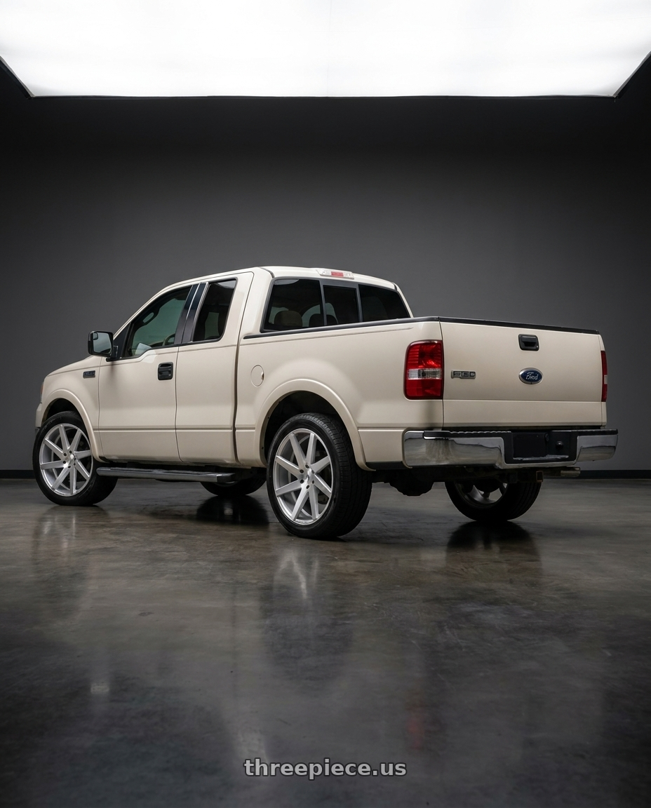 2007 Ford F-150 with Status BRUTE 6X139.7 24X9.5 +15 SILVER W/ BRUSHED MACHINED FACE wheels rear three quarter view square tires