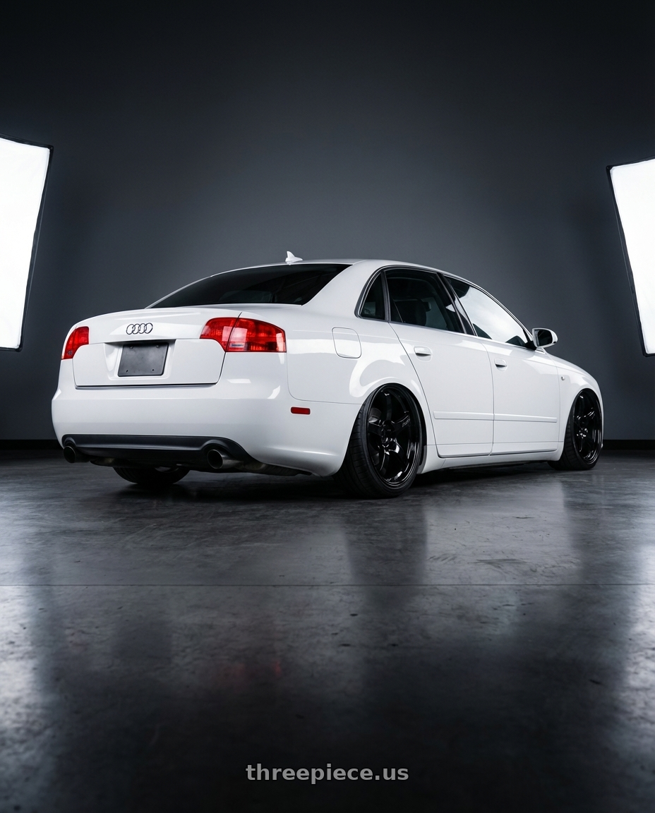 2010 Audi A4 B7 with Gram Lights 57CR 5x112 19x10.5+35 Glossy Black wheels rear three quarter view slight stretch tires