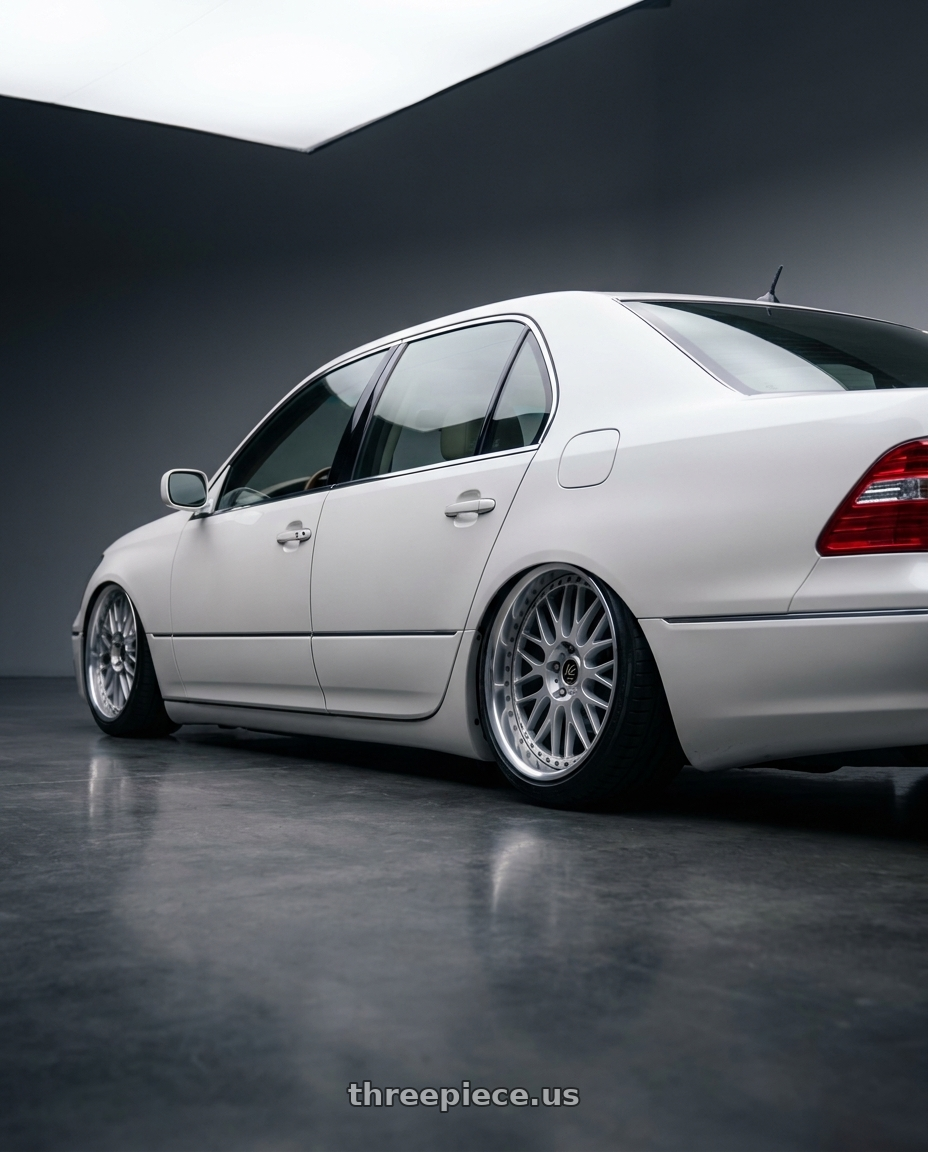 2004 lexus ls430 with Work Vs-Xx 5x114.3 18x10.5+15 R Disk Light Grey Silver wheels rear three quarter view slight stretch tires