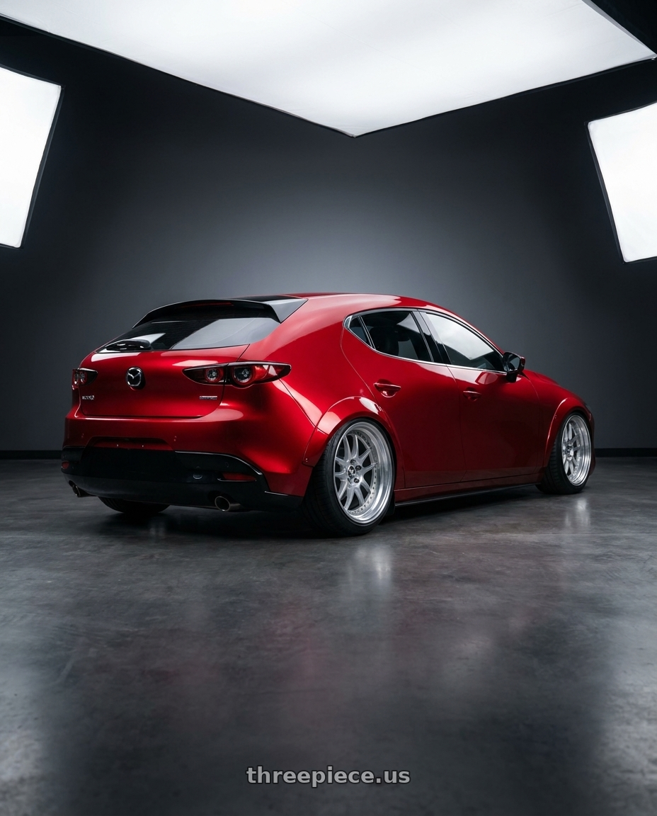 2025 Mazda 3 with ESR Wheels APEX SERIES APX01 5x100 18x9.5 +22 Hyper Silver wheels rear three quarter view slight stretch tires