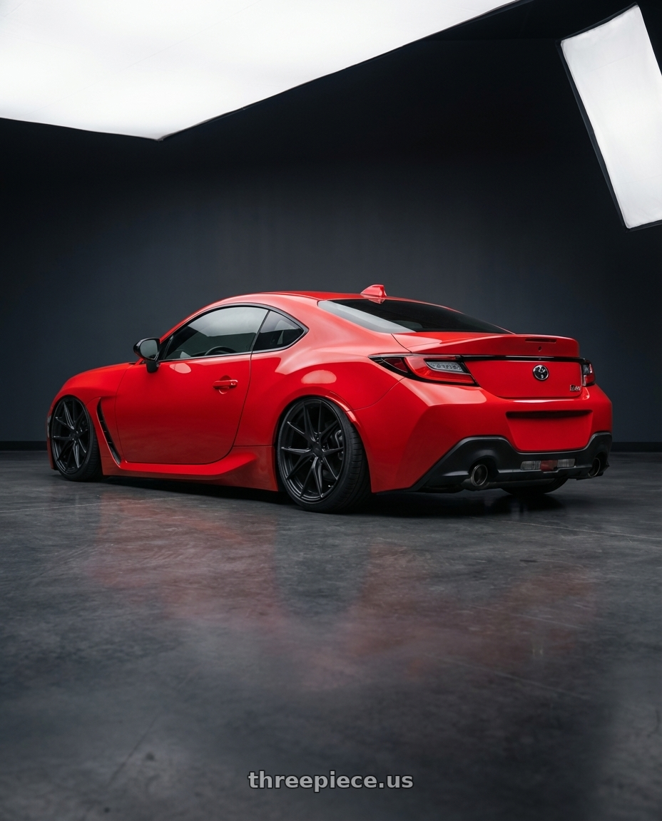 2024 Toyota GR86 with Niche 1PC M117 MISANO 5X114.3 18X9.5 +40 MATTE BLACK wheels rear three quarter view slight stretch tires