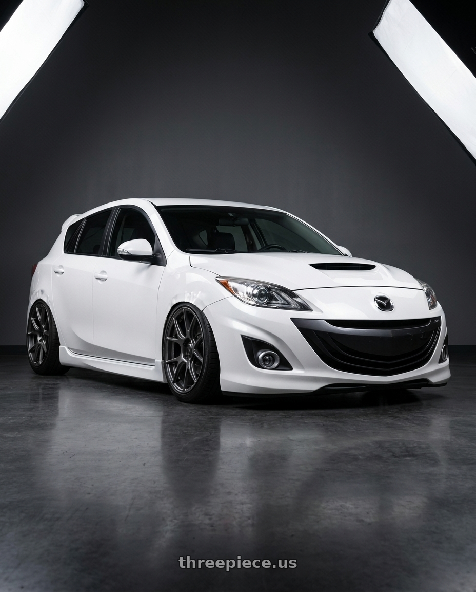 2012 Mazda Mazdaspeed3 with Konig Ampliform 5x114.3 18x9.5+35 Dark Metallic Graphite wheels