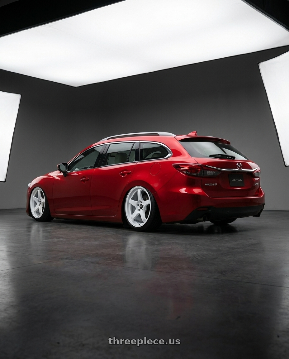 2021 Mazda 6 wagon with MST Wheels CR 5X114.3 18X8.5 +35 Alabaster White wheels rear three quarter view slight stretch tires