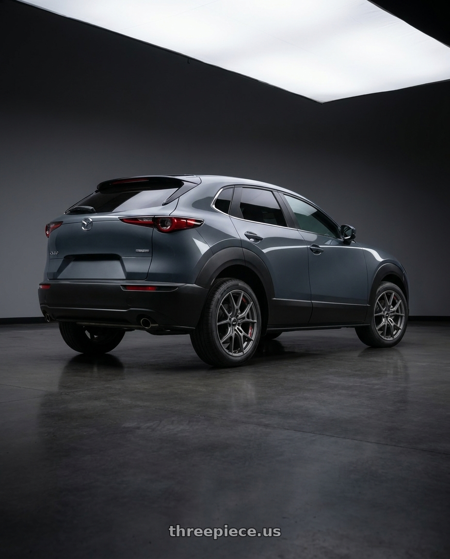 2026 mazda cx-30 with Gram Lights 57FXZ Overseas Model 5x114.3 18x8.5+45 Matte Graphite wheels rear three quarter view square tires