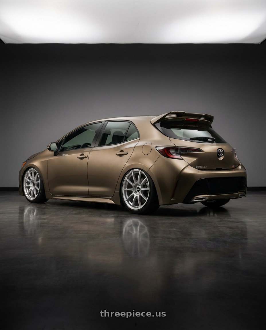 2019 Corolla hatch se oxidize bronze with spoiler with Enkei TS9 5x100 18x8.5+45 Silver Paint wheels rear three quarter view slight stretch tires