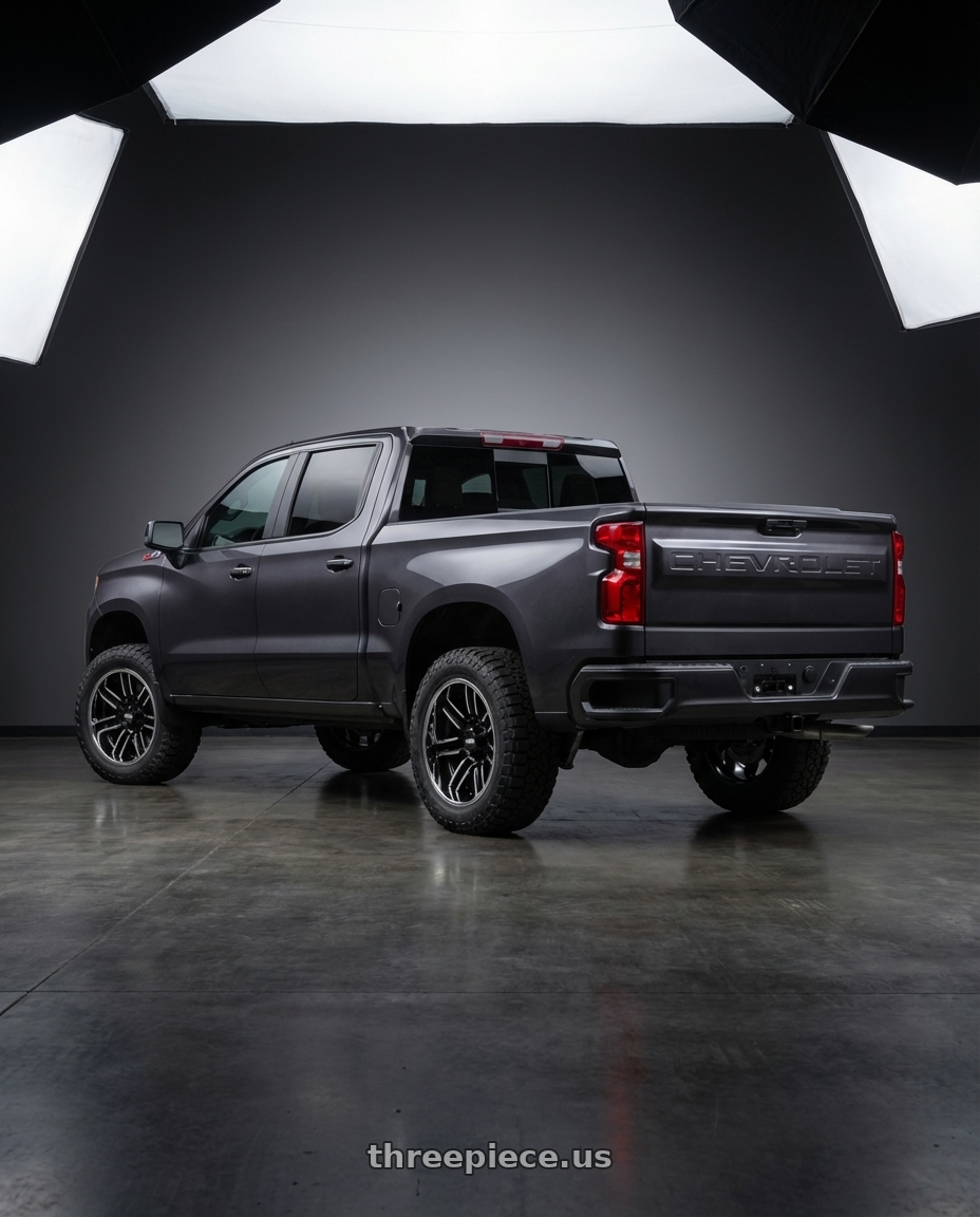 2023 Chevrolet Silverado 1500 with Moto Metal MO202 6X139.7 20X12 -44 GLOSS BLACK MACHINED CENTER CHROME LIP wheels rear three quarter view meaty tires