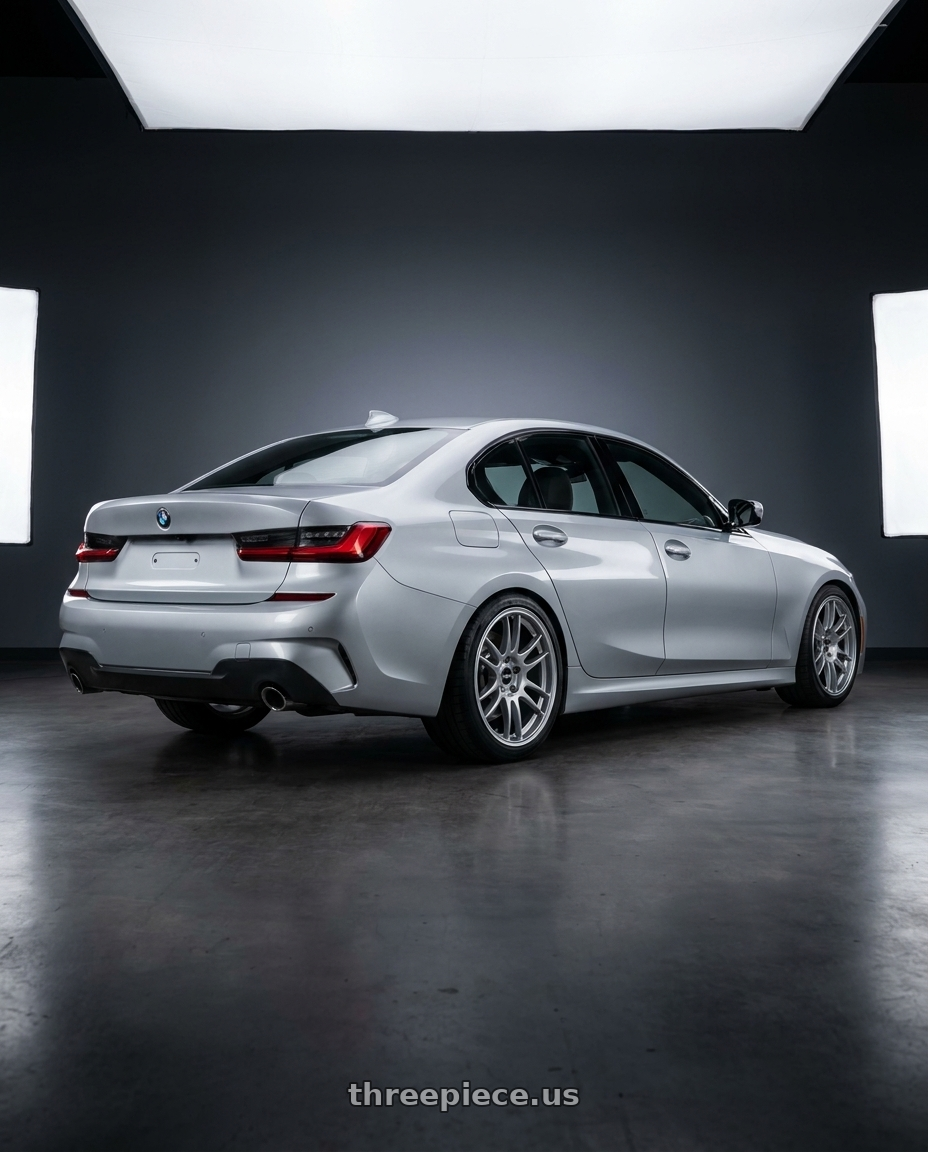 2023 BMW 3 Series G20 with Enkei GTC02 5x112 18x8+45 Hyper Silver wheels rear three quarter view square tires
