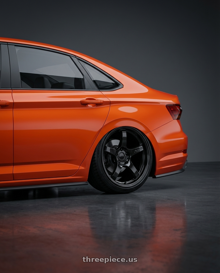 2023 Volkswagen Jetta GLI MK7 with Gram Lights 57CR 5x112 19x10.5+35 Glossy Black wheels rear three quarter view slight stretch tires