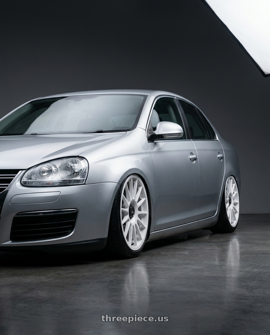 2009 Volkswagen Jetta GLI MK5 with fifteen52 PODIUM 5x112 / 5x120 18x8.5 +35 RALLY WHITE (GLOSS WHITE) wheels