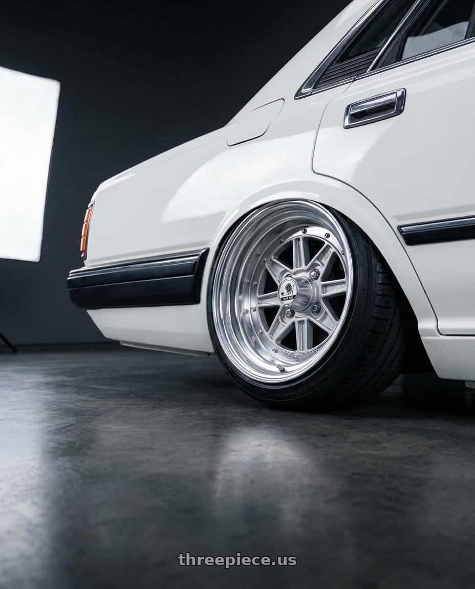 1983 Nissan 280c with Speed Star Mk-III 4x100 13X8.5+-9  Silver wheels rear three quarter view extreme stretch tires