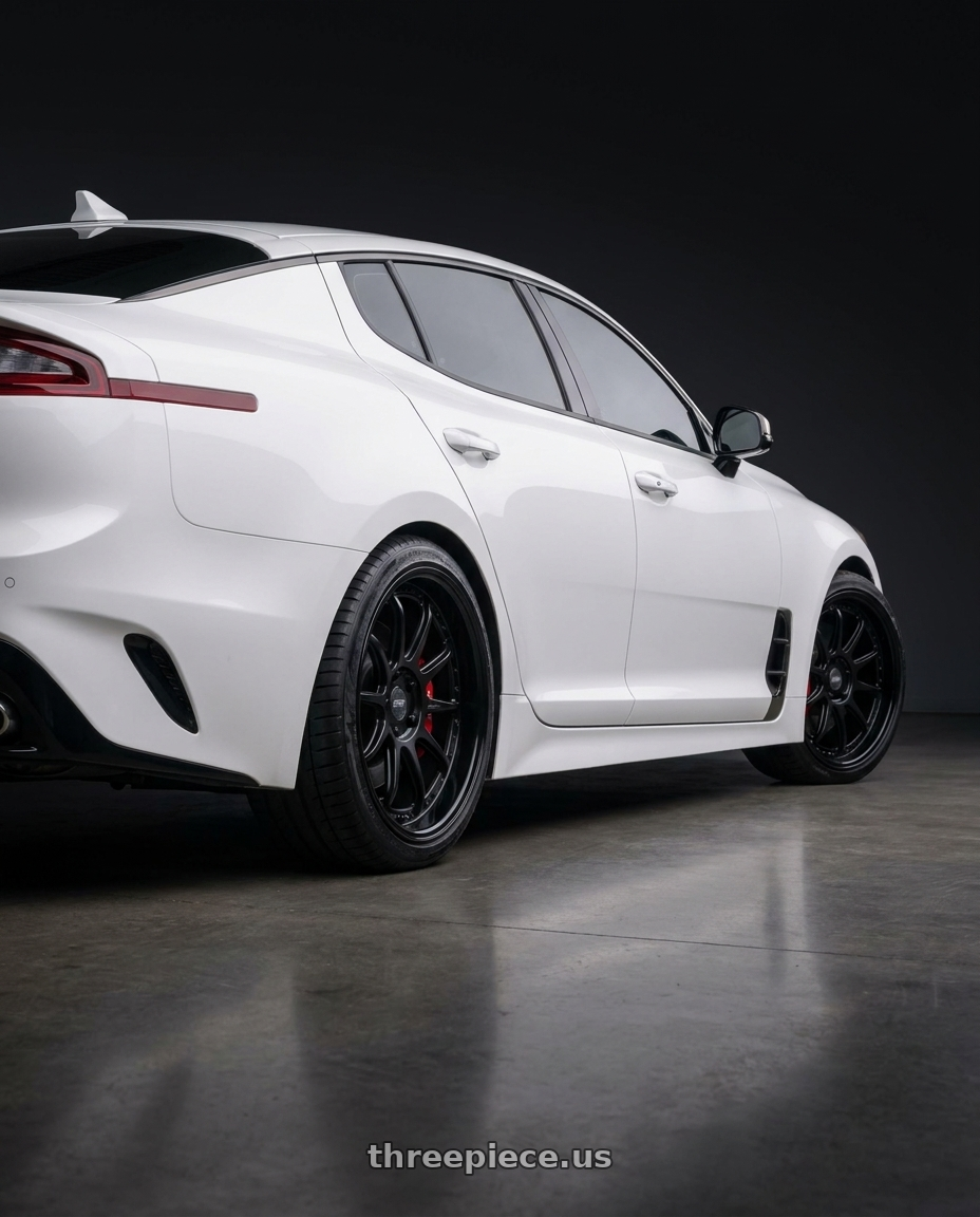 2019 Kia Stinger GT2 with ESR Wheels CS12 5x114.3 18x8.5 +35 Matte Black wheels rear three quarter view square tires