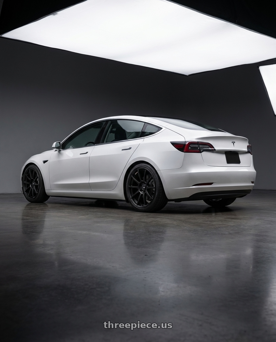 2023 Tesla Model 3 with Ssr Gtv02 5x114.3 19x8.5+38  FLAT BLACK wheels rear three quarter view square tires