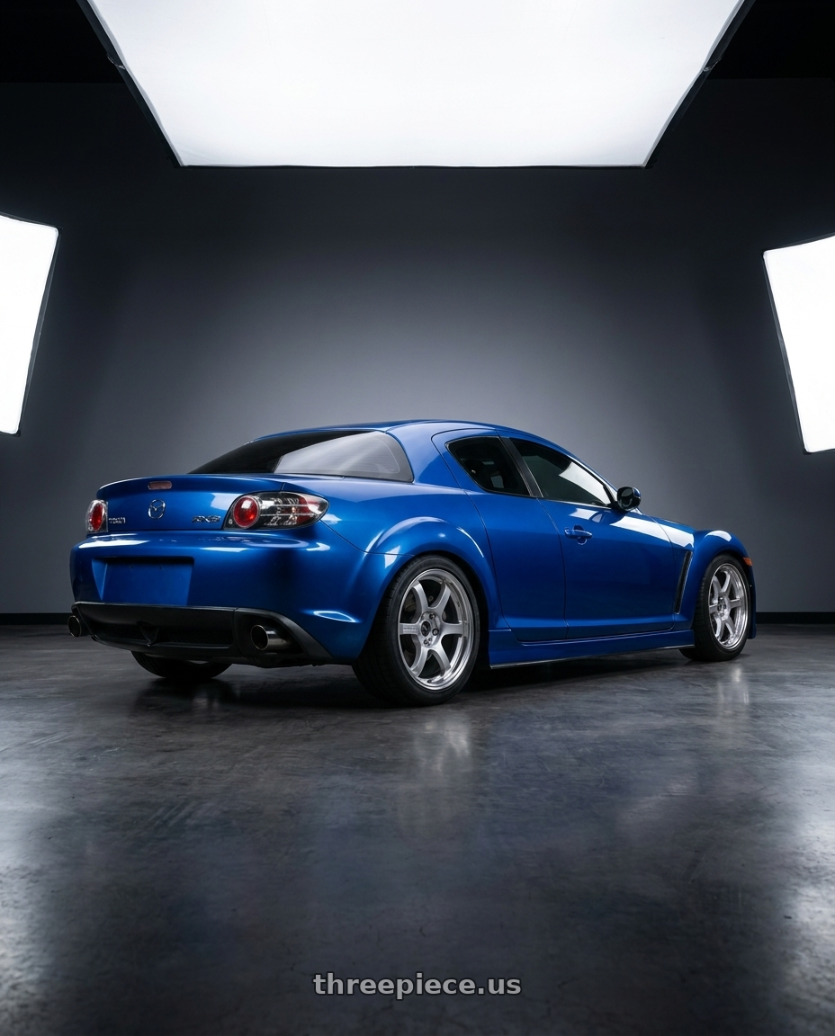 2005 Mazda RX8 with Gram Lights 57DR 5x114.3 18x9.5+38 Grace Silver wheels rear three quarter view square tires