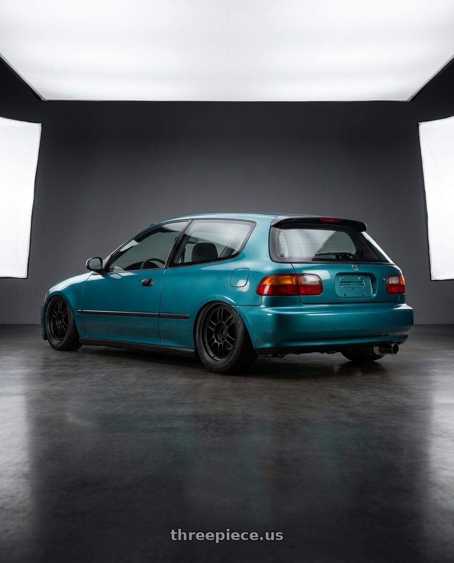 1992 Honda civic hatchback with Enkei RPF1 4x100 15x7+35 Black wheels rear three quarter view slight stretch tires