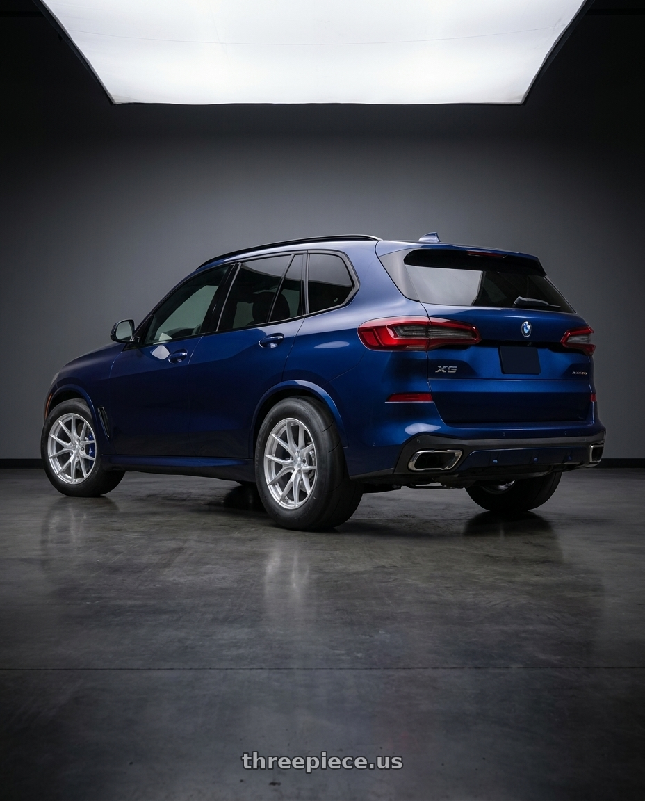 2026 BMW X5 with Aodhan AFF7 5x112 19x9.5+35 Gloss Silver Machined Face wheels rear three quarter view excessive tires