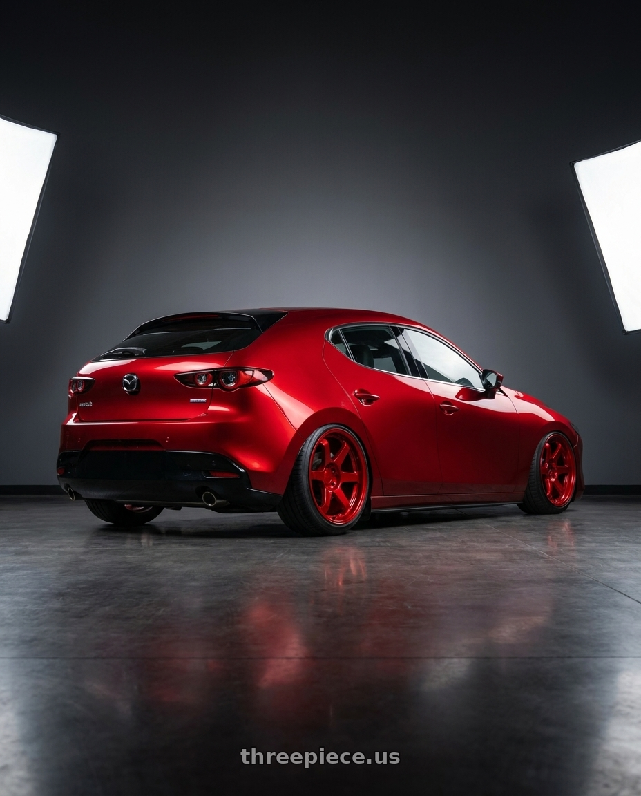 2024 Mazda 3 with 9six9 SIX-1 5x114.3 18X8.5 +20 Candy Apple Red wheels rear three quarter view extreme stretch tires