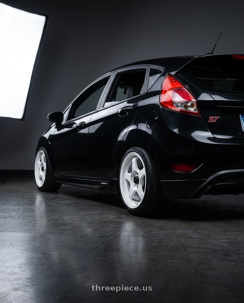 2016 ford fiesta st with Vors SP1 4x108 15x7  +35 All White wheels rear three quarter view square tires