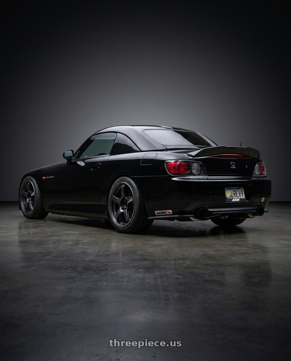 2000 Honda S2000ma with Advan Racing TC4 5x114.3 17x8.0 +45 BLACK GUNMETALLIC & RING wheels rear three quarter view square tires